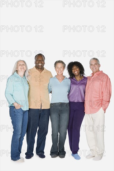 Studio portrait of senior friends. Photo : Rob Lewine