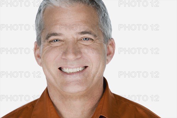 Studio portrait of mature man. Photo : Rob Lewine