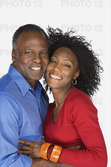 Studio portrait of mature couple. Photo : Rob Lewine