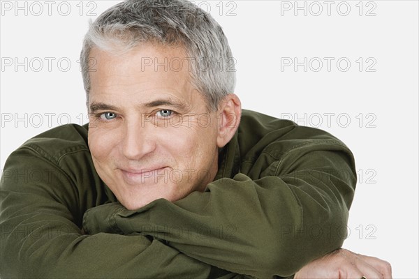 Studio portrait of mature man. Photo : Rob Lewine