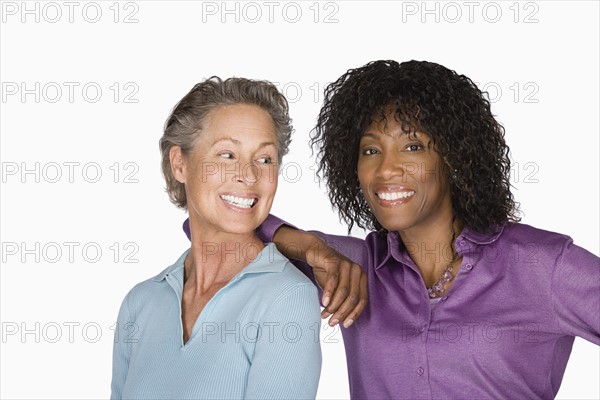Studio portrait of two mature women. Photo: Rob Lewine