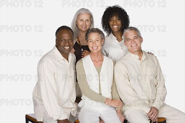 Studio portrait of senior friends. Photo : Rob Lewine