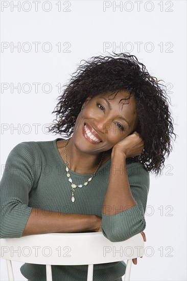 Studio portrait of mature woman. Photo : Rob Lewine