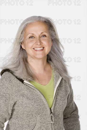 Studio portrait of mature woman. Photo : Rob Lewine