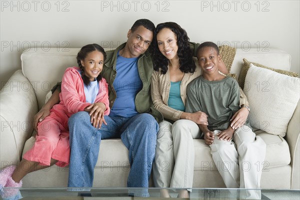 Portrait of parents with children (10-13). Photo : Rob Lewine