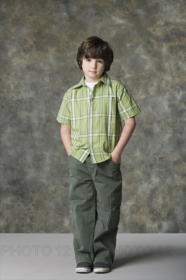 Portrait of boy (6-7), studio shot. Photo: Rob Lewine