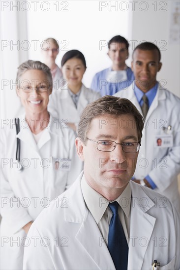 Group portrait of smiling doctors. Photo : Rob Lewine