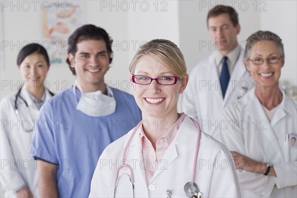 Group portrait of smiling doctors. Photo: Rob Lewine