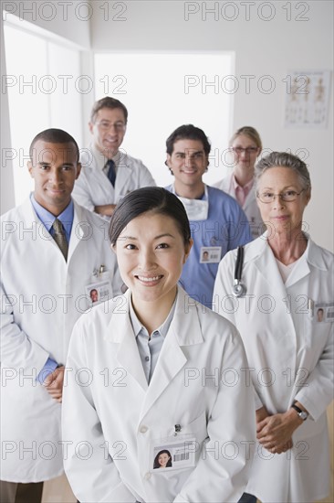 Group portrait of smiling doctors. Photo : Rob Lewine