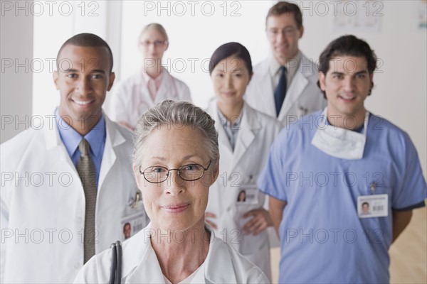 Group portrait of smiling doctors. Photo : Rob Lewine