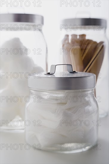 Close up of gauze and spatulas in jars studio shot. Photo: Rob Lewine