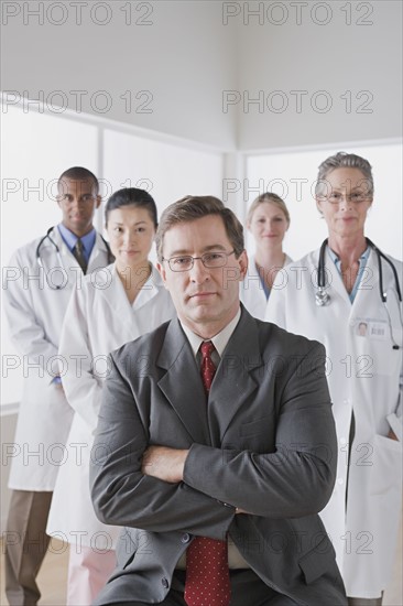 Group portrait of smiling doctors. Photo : Rob Lewine