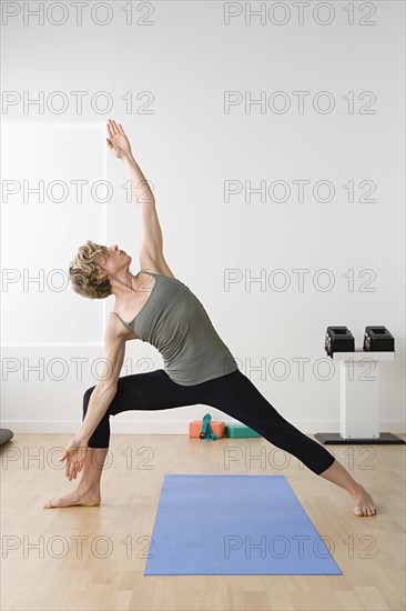 Woman in yoga pose. Photo : Rob Lewine