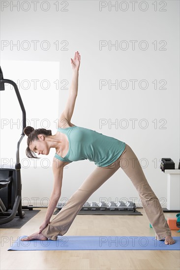 Woman stretching. Photo : Rob Lewine