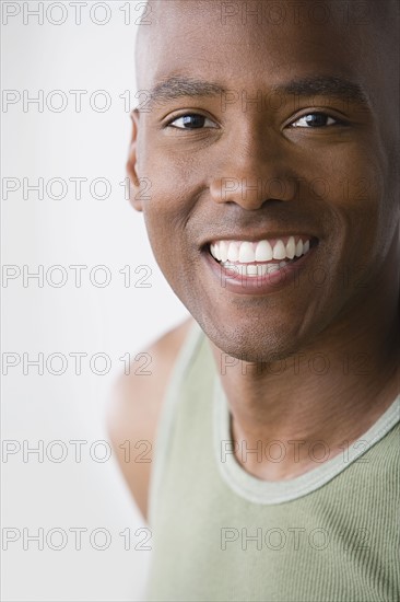 Portrait of man smiling. Photo : Rob Lewine