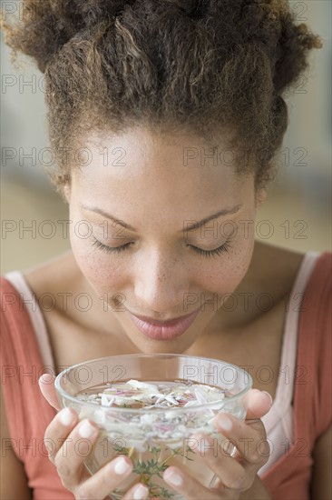 Woman relaxing with aromatherapy. Photo : Rob Lewine