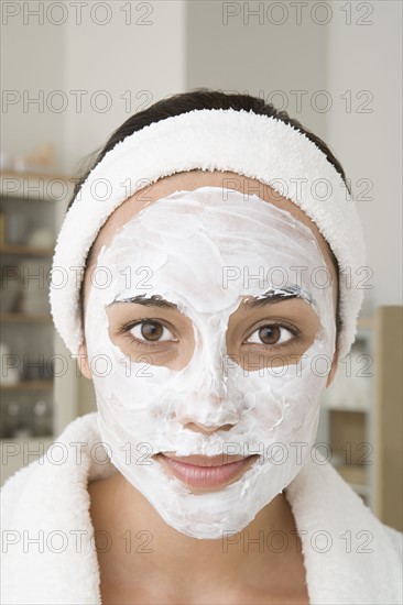 Portrait of woman with facial mask. Photo : Rob Lewine