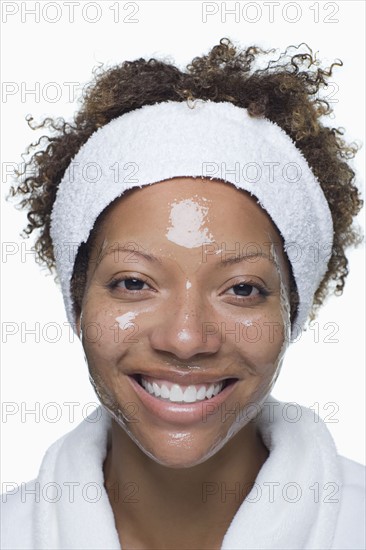 Portrait of attractive woman with facial mask. Photo : Rob Lewine