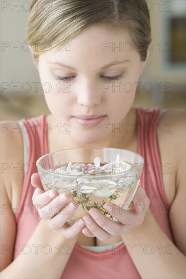 Woman enjoying aromatherapy. Photo : Rob Lewine