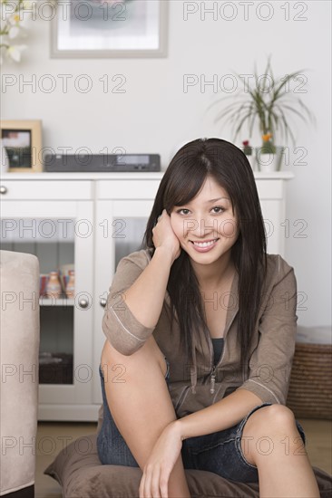 Woman relaxing at home. Photo : Rob Lewine