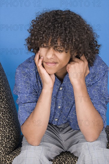 Portrait of teenage boy (14-15). Photo : Rob Lewine