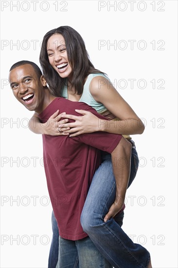 Portrait of young couple enjoying together. Photo : Rob Lewine