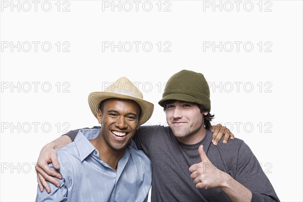 Studio portrait of two young men. Photo : Rob Lewine