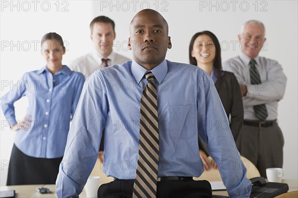 Portrait of business people in office. Photo : Rob Lewine