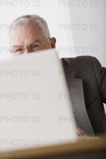 Portrait of mature businessman. Photo : Rob Lewine