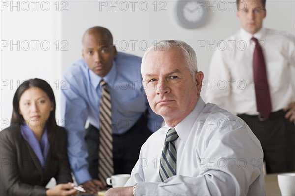 Portrait of business people in office. Photo : Rob Lewine