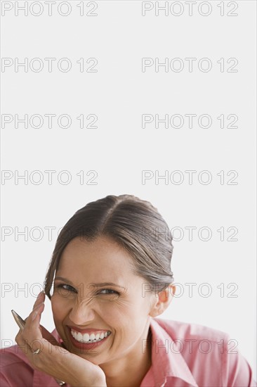 Portrait of happy businesswoman. Photo : Rob Lewine