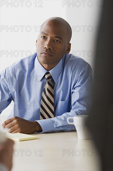 Businessman in office. Photo: Rob Lewine