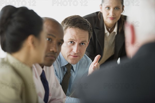 Portrait of business people in office. Photo : Rob Lewine