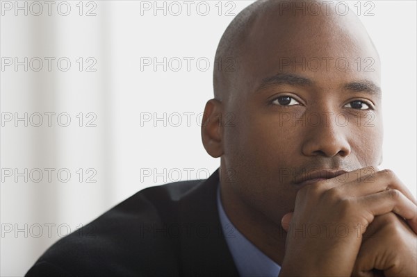 Businessman in office. Photo: Rob Lewine