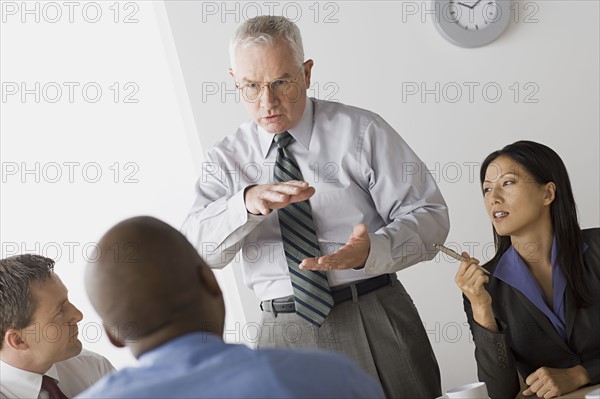 Portrait of business people in office. Photo : Rob Lewine