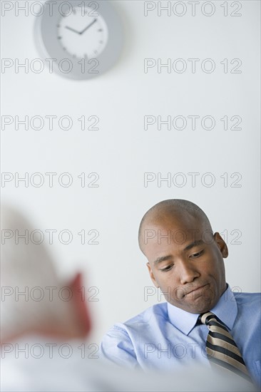 Businessman in office. Photo : Rob Lewine