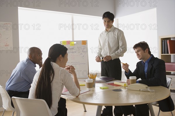 Business people working in office. Photo : Rob Lewine