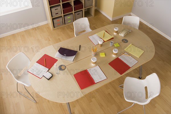 Elevated view of conference table in board room. Photo : Rob Lewine