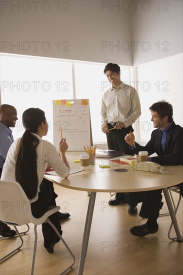 Business people working in office. Photo : Rob Lewine