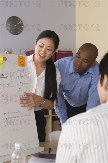 Business people working in office. Photo : Rob Lewine