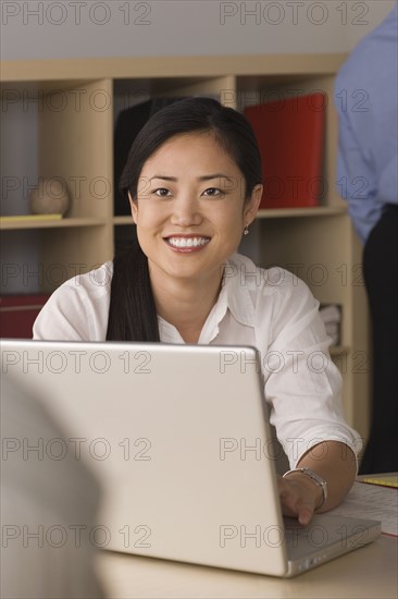 Portrait of businesswoman in office. Photo : Rob Lewine