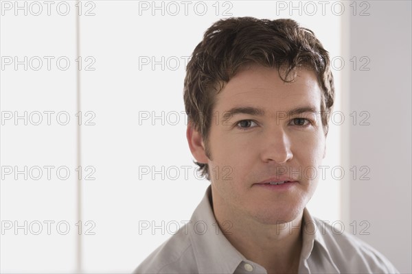 Portrait of young businessman. Photo : Rob Lewine