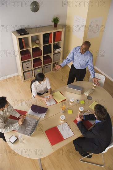 Group of businesspeople in meeting. Photo: Rob Lewine