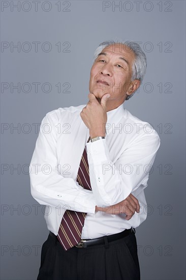 Portrait of senior businessman. Photo: Rob Lewine