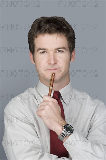 Portrait of young businessman. Photo : Rob Lewine