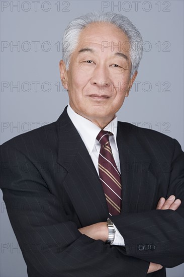 Portrait of senior businessman. Photo : Rob Lewine