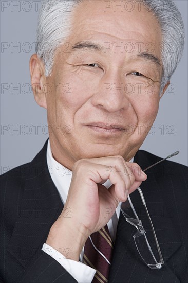 Portrait of senior businessman. Photo : Rob Lewine