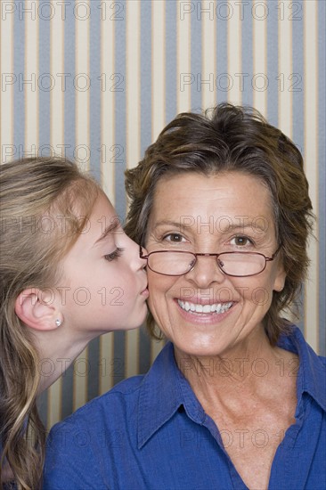 Portrait of girl (8-9) with grandmother. Photo : Rob Lewine