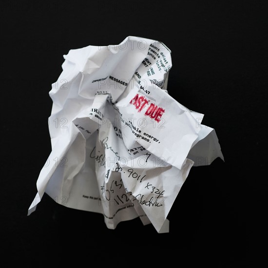 Studio shot of crumpled document.