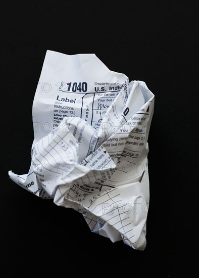 Studio shot of crumpled document.